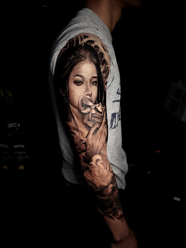 Explore men thigh tattoo ideas, creative tattoo ideas in Hollywood, available at Sacred Eye Tattoos