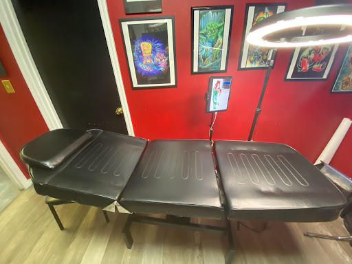 Explore sternum tattoo ideas for females, creative tattoo ideas in Zephyrhills, available at Lions Den Tattoo Company