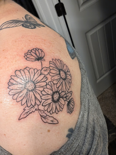 Explore ghost band tattoo ideas, creative tattoo ideas in Clarksville, available at Leap Then Look Tattoo