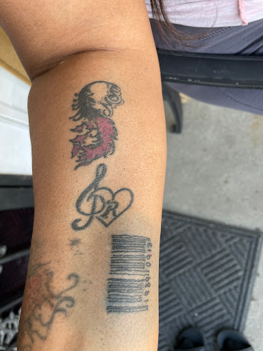 Explore tattoo ideas for grandpa, creative tattoo ideas in Redford, available at Prime Tattoo & Beauty