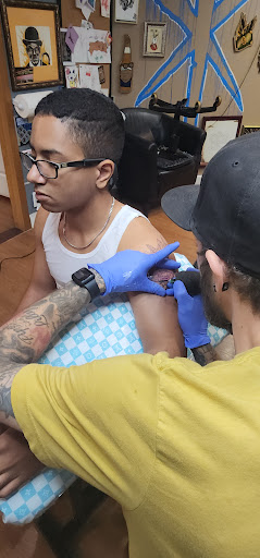 Explore twin miscarriage tattoo ideas, creative tattoo ideas in Saint Marys, available at WarHawk Tattoo Company ST MARYS