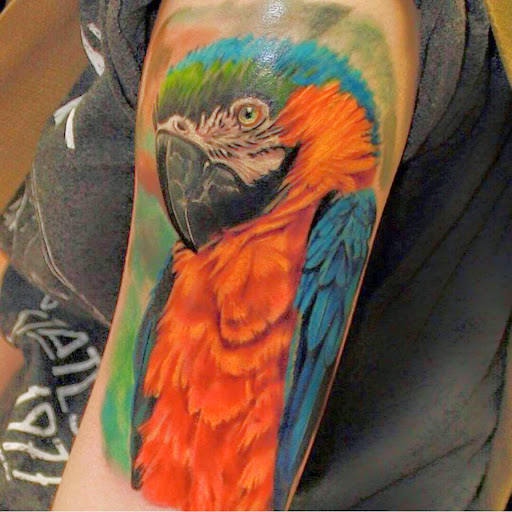 Explore lower back cover up tattoo ideas, creative tattoo ideas in Fort Wayne, available at Grade A Tattoos and Body Piercing