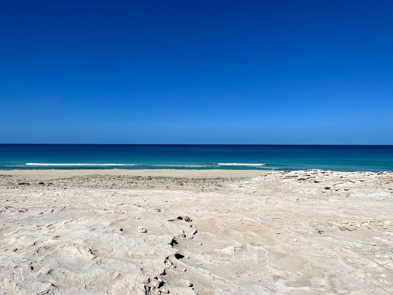 Foto van Golgota Beach met turquoise puur water oppervlakte