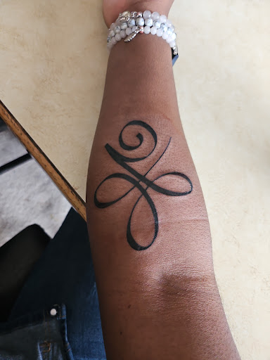 Explore elton john tattoo ideas, creative tattoo ideas in Downers Grove, available at Divine Ink