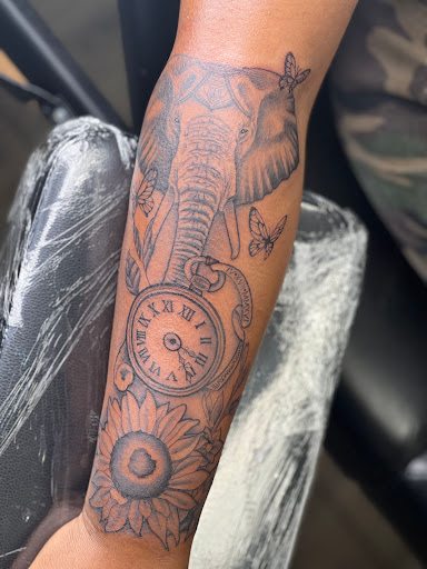 Explore black queen tattoo ideas, creative tattoo ideas in Rochester, available at Forest Ink Tattoos