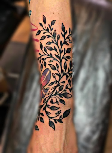 Explore family tree tattoo ideas for men, creative tattoo ideas in Belgrade, available at The Loyal Sparrow Tattoo and Piercing