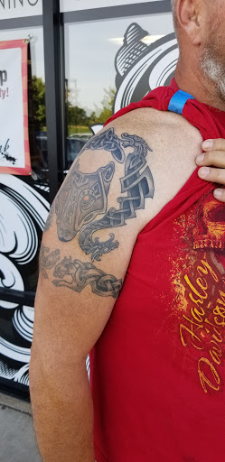 Explore husband name tattoo ideas for wife, creative tattoo ideas in Crystal Lake, available at Monster Ink Tattoo & Piercing Studio