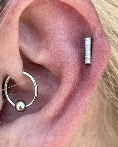 Explore isabella tattoo ideas, creative tattoo ideas in Oklahoma City, available at Oklahoma Tattoo Collective