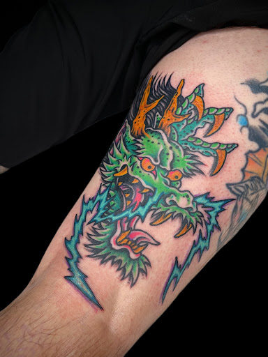 Explore male rib tattoo ideas, creative tattoo ideas in Johnson City, available at Gold Cross Tattoo Co.