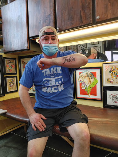 Explore medium tattoo ideas for men, creative tattoo ideas in Erie, available at Ink Assassins