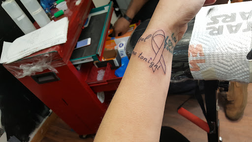 Explore bella tattoo ideas, creative tattoo ideas in Waterloo, available at Cedar Valley Tattoo & Piercing Studio