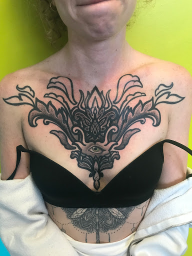 Explore side tattoo ideas for females, creative tattoo ideas in Saint Petersburg, available at Buku Tattoo Studio