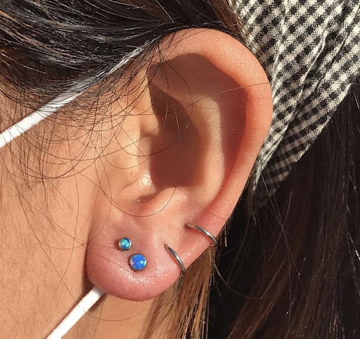 Explore top of hand tattoo ideas, creative tattoo ideas in San Diego, available at Luna Studio Body Piercings & Tooth gems