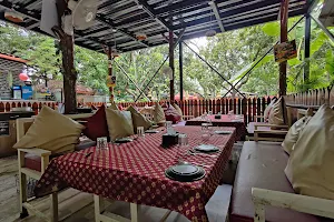 The mango family garden restaurant image