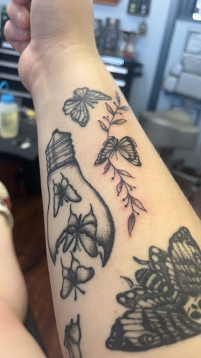 Explore jurassic park tattoo ideas, creative tattoo ideas in Hudson, available at Twisted Canvas Tattoo and Art Studio