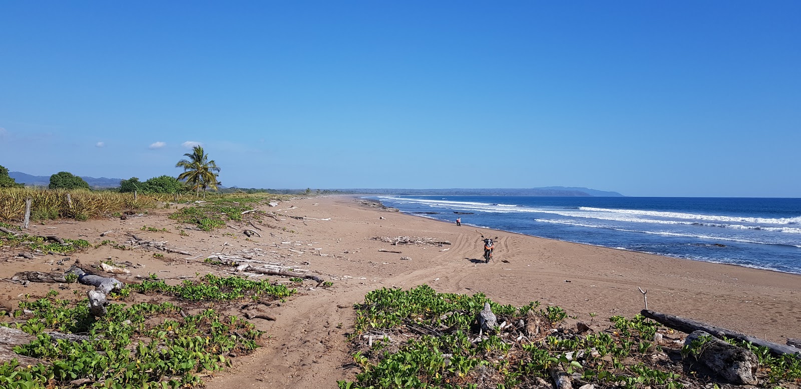 Playa Ario的照片 带有米色沙子表面