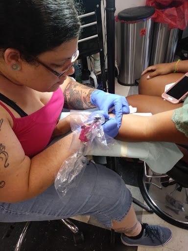 Tattoo Shop «Ink Slingers», reviews and photos, 1355 E Kearney St, Springfield, MO 65803, USA