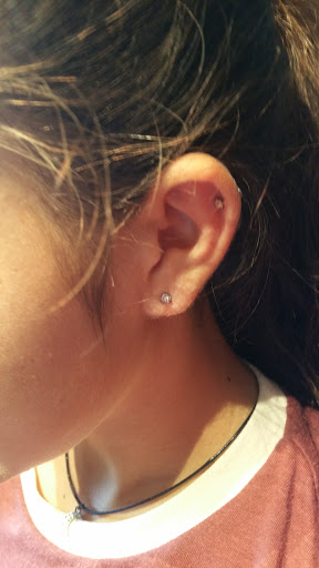 Explore hibiscus flower tattoo ideas, creative tattoo ideas in Omaha, available at Liquid Courage Tattoos