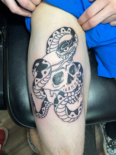 Explore leg flower tattoo ideas, creative tattoo ideas in Mansfield, available at The Marksman Tattoo Company