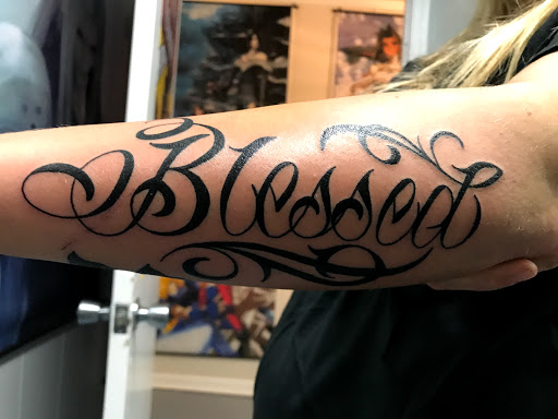 Explore cover up tattoo ideas leg, creative tattoo ideas in Muncie, available at The Tattoo Studio