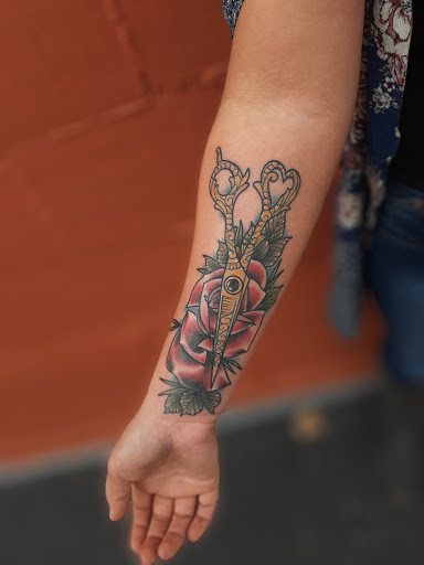 Explore wrist cross tattoo ideas, creative tattoo ideas in Lakeview, available at Backwoods Tattoo Studio