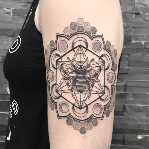 Explore stomach tattoo ideas for men, creative tattoo ideas in Miami, available at INKAHOLIK TATTOOS