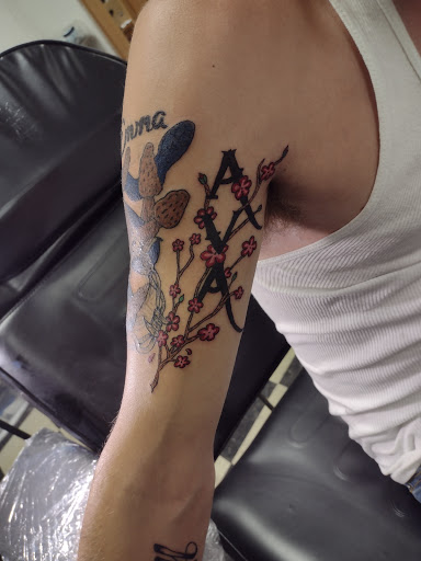 Explore meaningful self love tattoo ideas, creative tattoo ideas in Owosso, available at Twisted ink tattoo