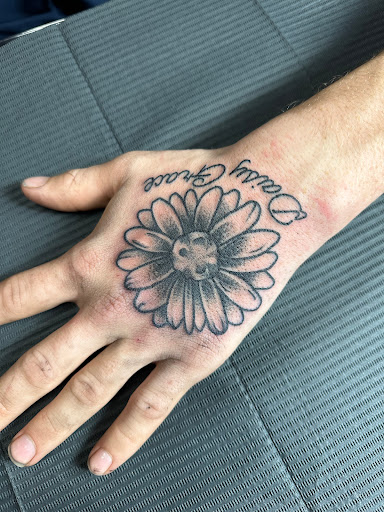Explore back ear tattoo ideas, creative tattoo ideas in Plattsmouth, available at Stabbed Ink