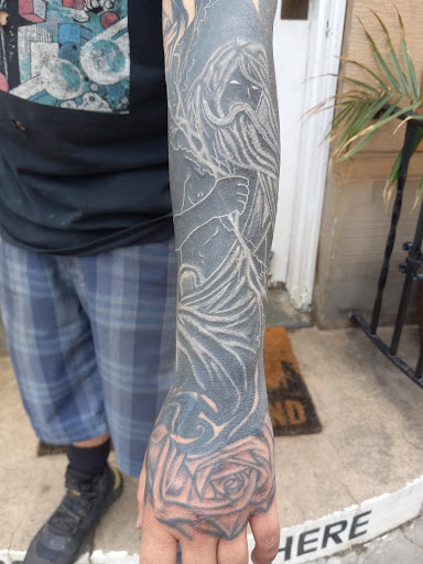 Explore loyalty over love tattoo ideas, creative tattoo ideas in Spencer, available at Youngs Tattoo