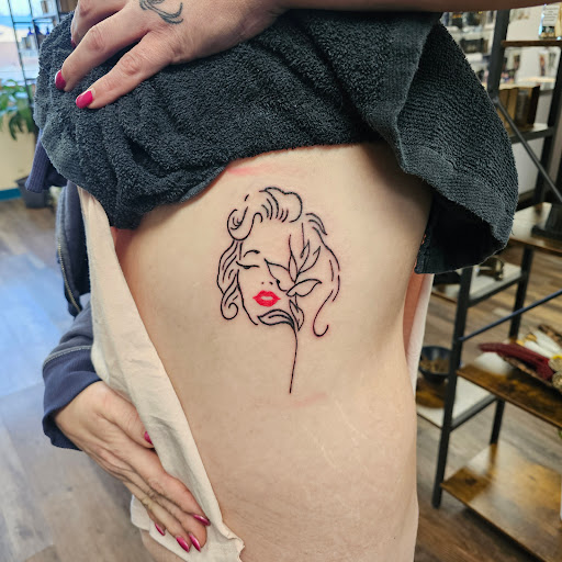 Explore male calf tattoo ideas, creative tattoo ideas in Traverse City, available at Pinups & Needles