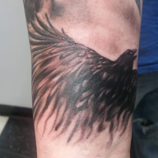 Find robotic tattoo ideas for your next unique tattoo in Hudson at Synchronicity Tattoo Studio Llc