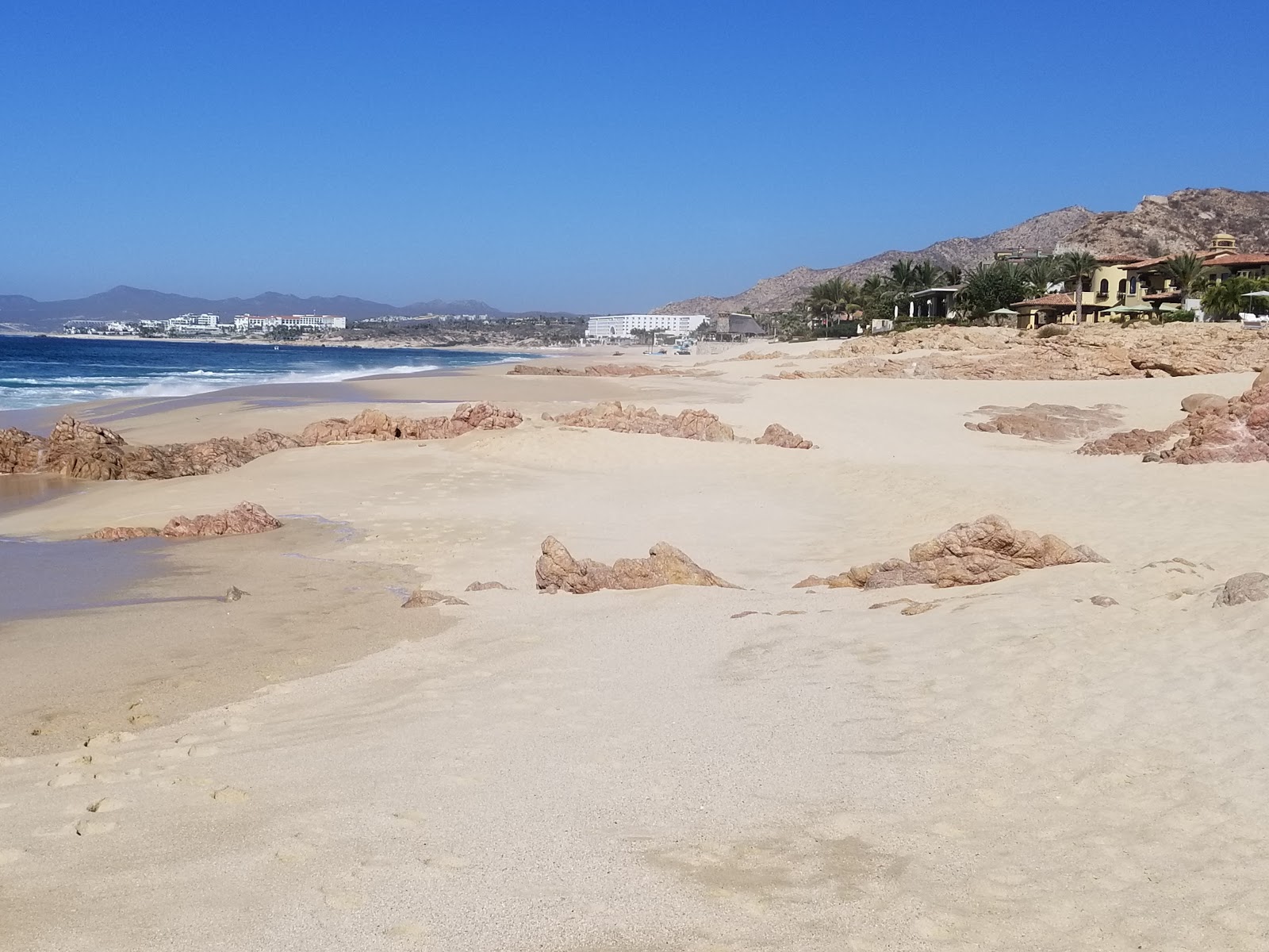 Fotografie cu Playa Cabo Real II cu o suprafață de nisip strălucitor