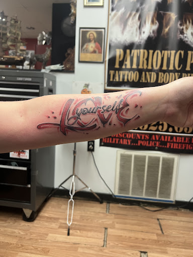Explore cleavage tattoo ideas, creative tattoo ideas in Export, available at Patriotic pain tattoo