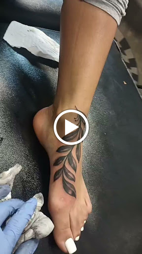 Explore axe tattoo ideas, creative tattoo ideas in Detroit, available at Swagg Shop (tattoos and piercings)