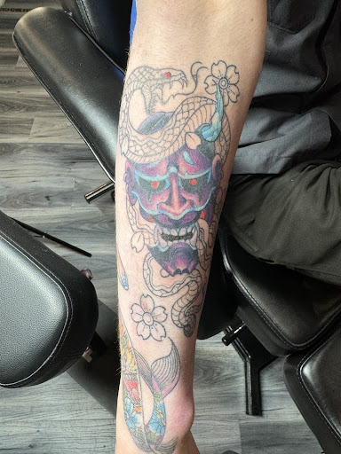 Explore black mens tattoo ideas, creative tattoo ideas in Rockford, available at Tattoo Bobs