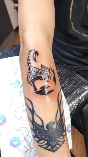 Explore mexican tattoo ideas for men, creative tattoo ideas in Milwaukee, available at West Allis Tattoo & Gallery Tattoo Shop Milwaukee