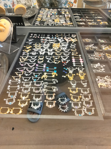 Explore bass guitar tattoo ideas, creative tattoo ideas in Cleveland, available at Body Revolution Tattoos & Body Piercings