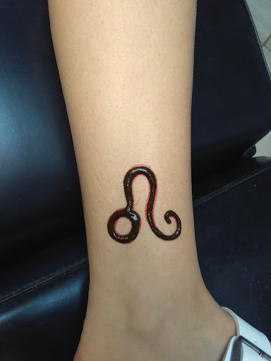 Explore bum cheek tattoo ideas, creative tattoo ideas in Bradenton, available at Memory Lane Tattoo Co.