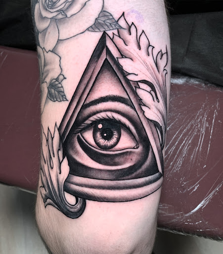 Explore cool guitar tattoo ideas, creative tattoo ideas in Arlington, available at Benchmark Tattoos