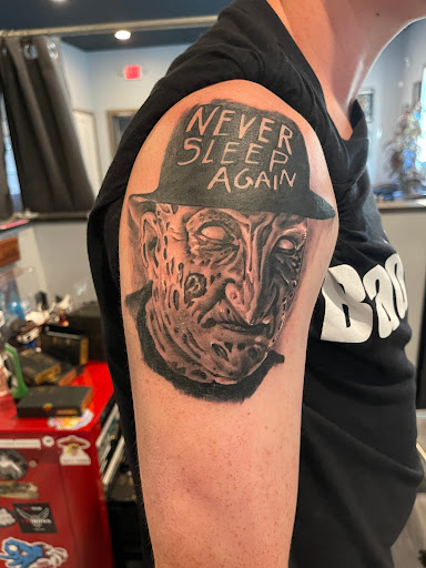 Explore dog nose print tattoo ideas, creative tattoo ideas in Pittsburgh, available at Skin Deep Tattoo Gallery