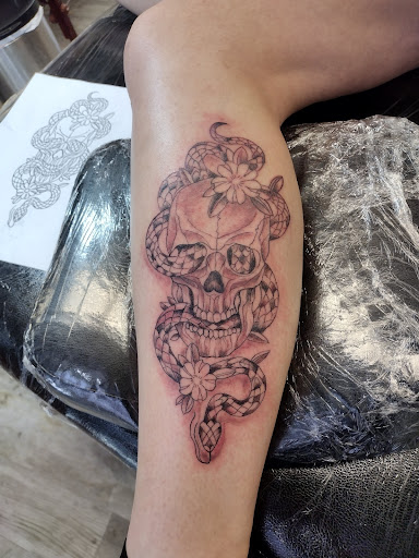 Explore cross tattoo sleeve ideas, creative tattoo ideas in La Crosse, available at La Crosse Tattoo