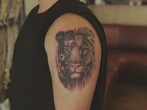 Explore tiny hummingbird tattoo ideas, creative tattoo ideas in Graham, available at Transcendence Art Studio & Tattoo