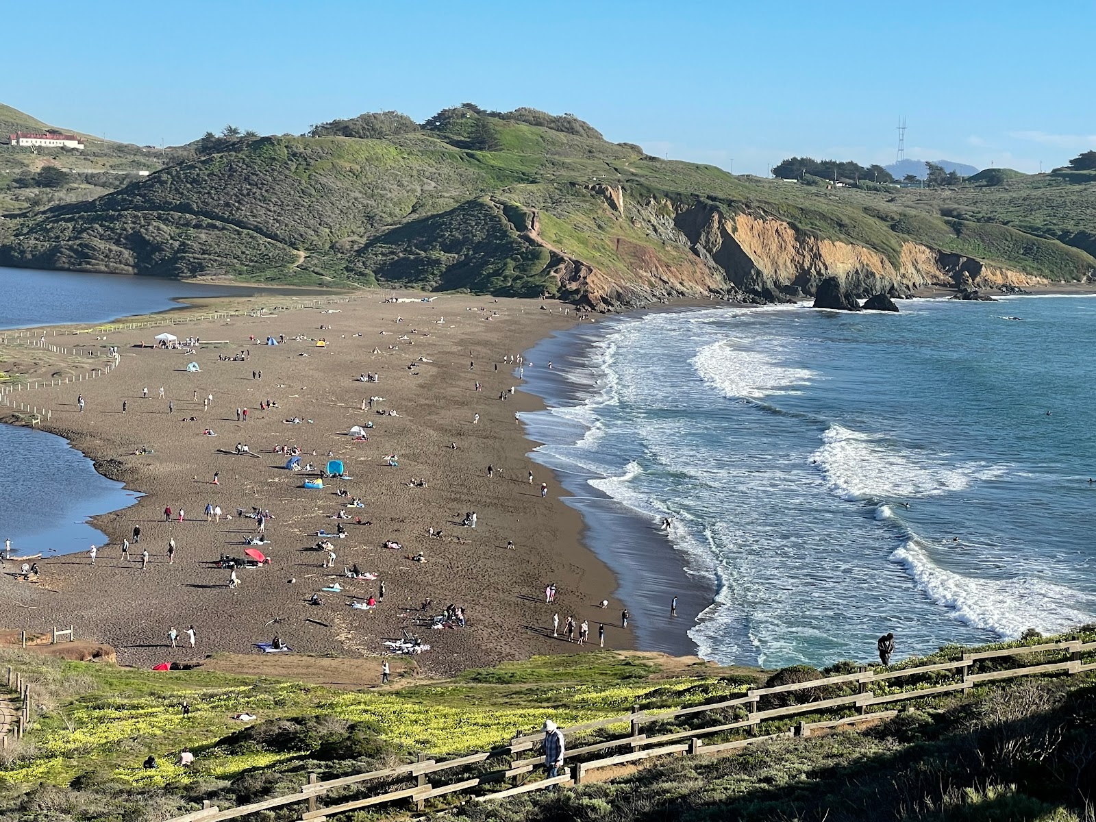 Photo of Rodeo Beach with turquoise water surface