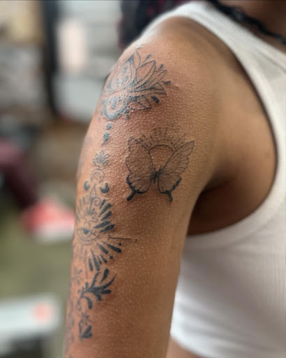 Explore upper back tattoo cover up ideas, creative tattoo ideas in Belgrade, available at The Loyal Sparrow Tattoo and Piercing