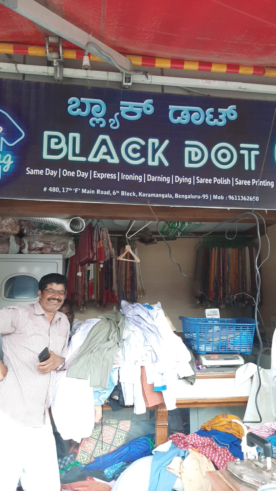 Black Dots Dry Cleaners