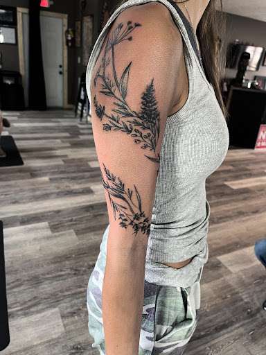 Explore spinal cord tattoo ideas, creative tattoo ideas in Gadsden, available at Sacred Art Tattoo Company