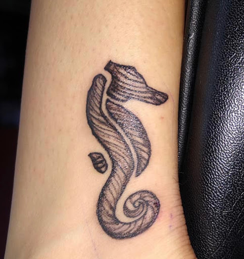 Explore heath ledger joker tattoo ideas, creative tattoo ideas in Okeechobee, available at Muck City Tattoos & Piercings