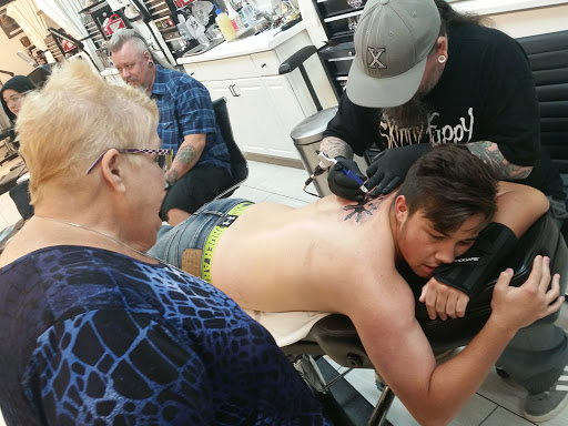 Explore never give up tattoo ideas, creative tattoo ideas in Fairview Heights, available at Inkwell Tattoos