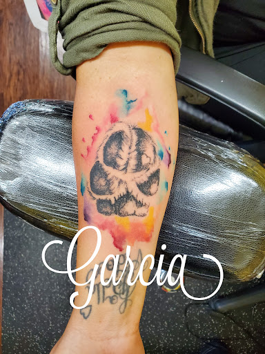 Explore wrist cover up tattoos ideas, creative tattoo ideas in Kearney, available at Ink Shop Tattoos & Piercings