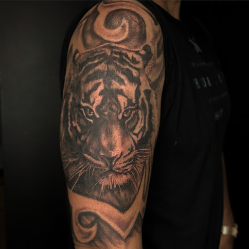 Explore cool shoulder tattoo ideas, creative tattoo ideas in Scarsdale, available at Damm Nice Tattoo & Body Art